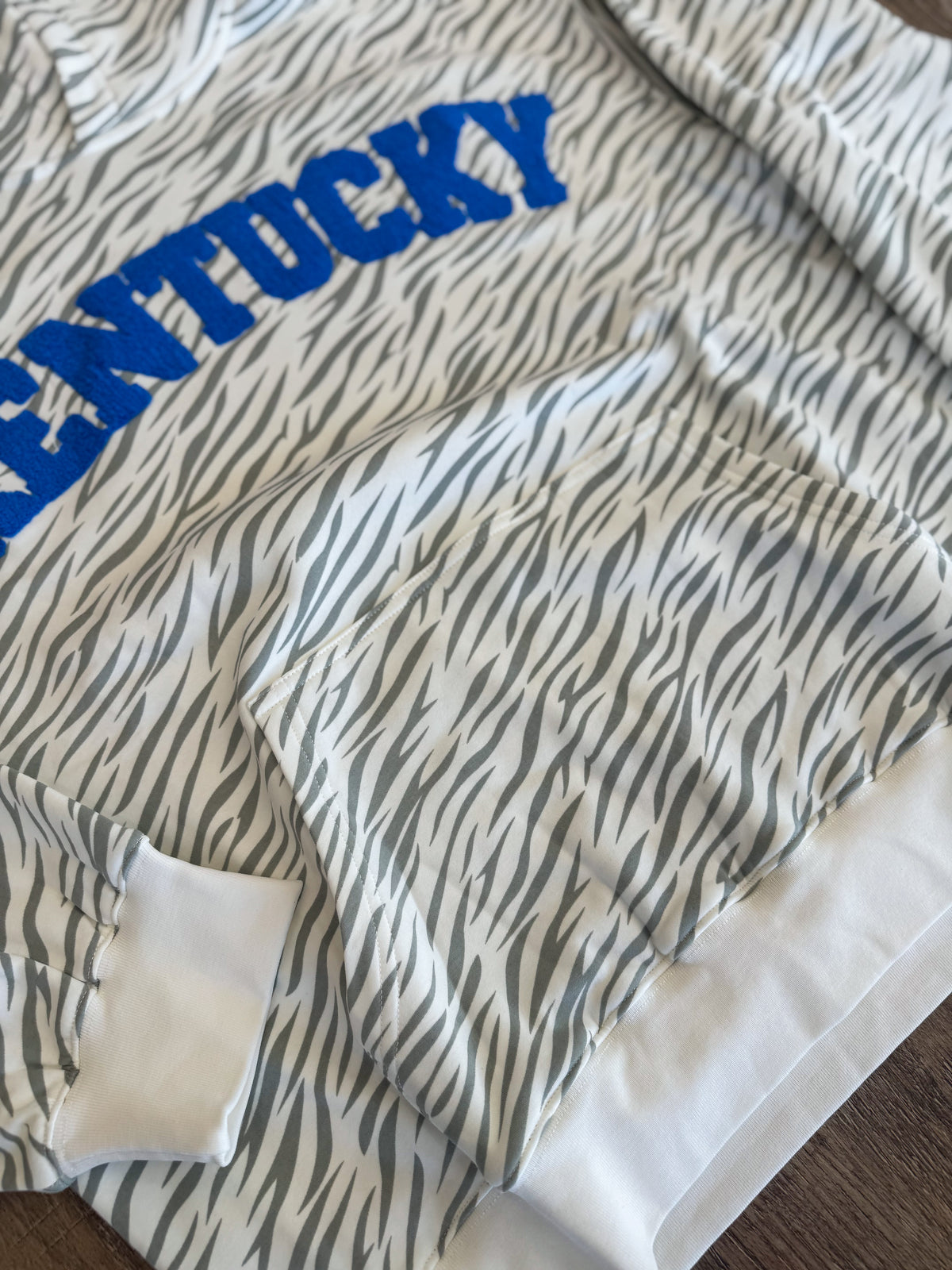 Alex "Kentucky / Wildcats" Puff Letter Patched Zebra Print Hoodie