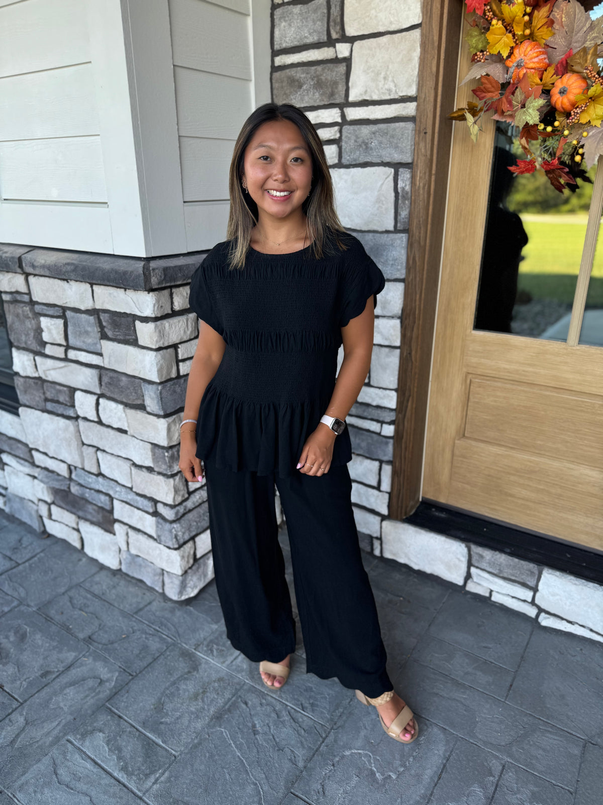 Tania Black Smocked Peplum Top