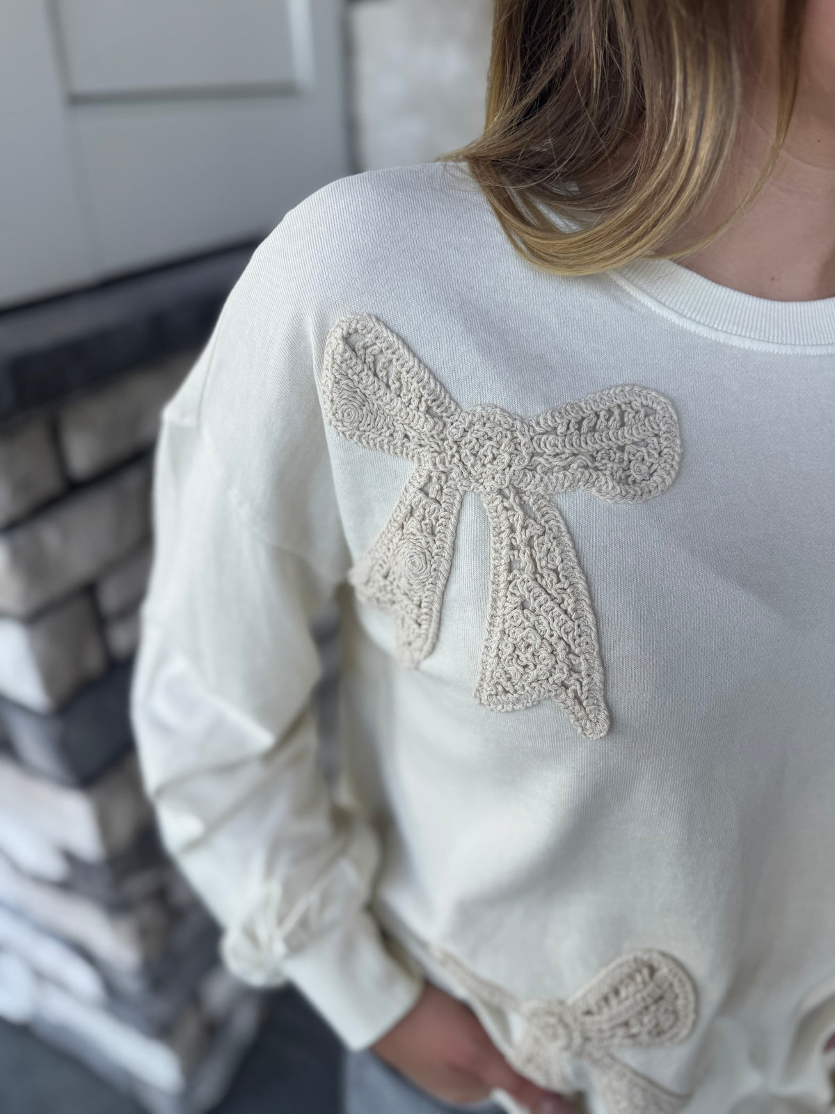 Shelly Ecru Crocheted Bow Patch Terry Pullover